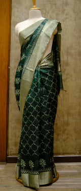 Designer Saree In Dark Green color