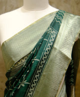Designer Saree In Dark Green color