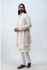 Ivory kurta with Achkan set, paired with mirror dupatta. sasyafashion